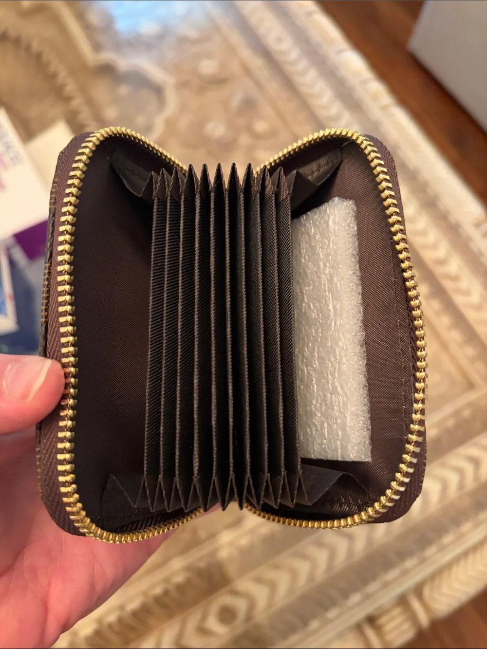Light and dark brown checkered Damier Zip Card Holder with Gold Hardware